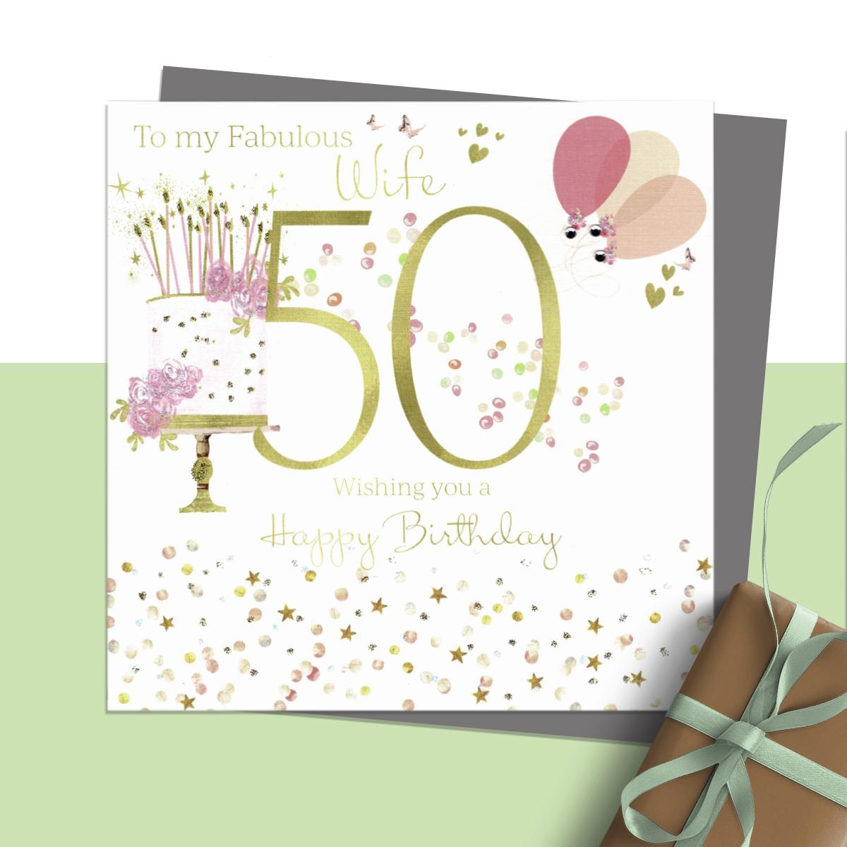 To My Fabulous Wife 50 Wishing You A Happy Birthday' Featuring Cake, Candles And Balloons'. Hand Finished With Sparkle And Jewel Embellishments. Hand Finished With Sparkle And Jewel Embellishments. Blank Inside For Own Message. Complete With Silver Coloured Envelope