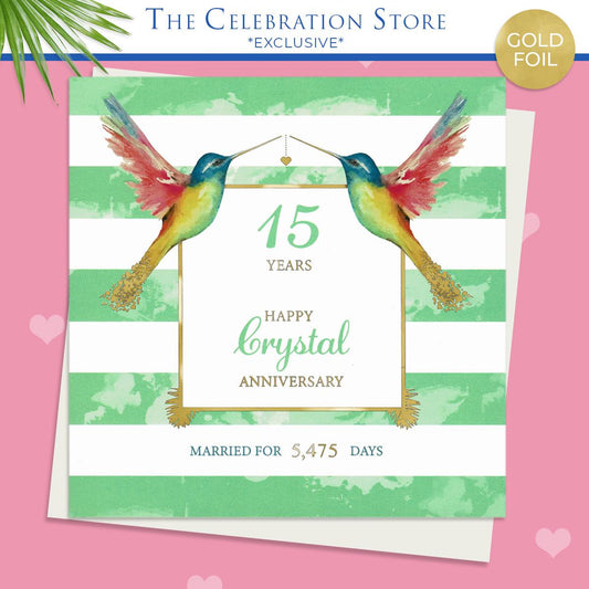 Crystal Hummingbird Anniversary Card Displayed On A Wooden Shelf