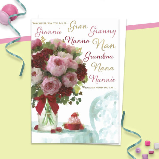 Whichever Way You Say It... Gran, Granny, Grannie, Nanna, Nan, Grandma, Nana, Nannie Whatever Word You Say...' A Beautiful Mother's Day Card for Any Female Grandparent. Showing Pink Peonies And Red Roses. Complete With White Envelope