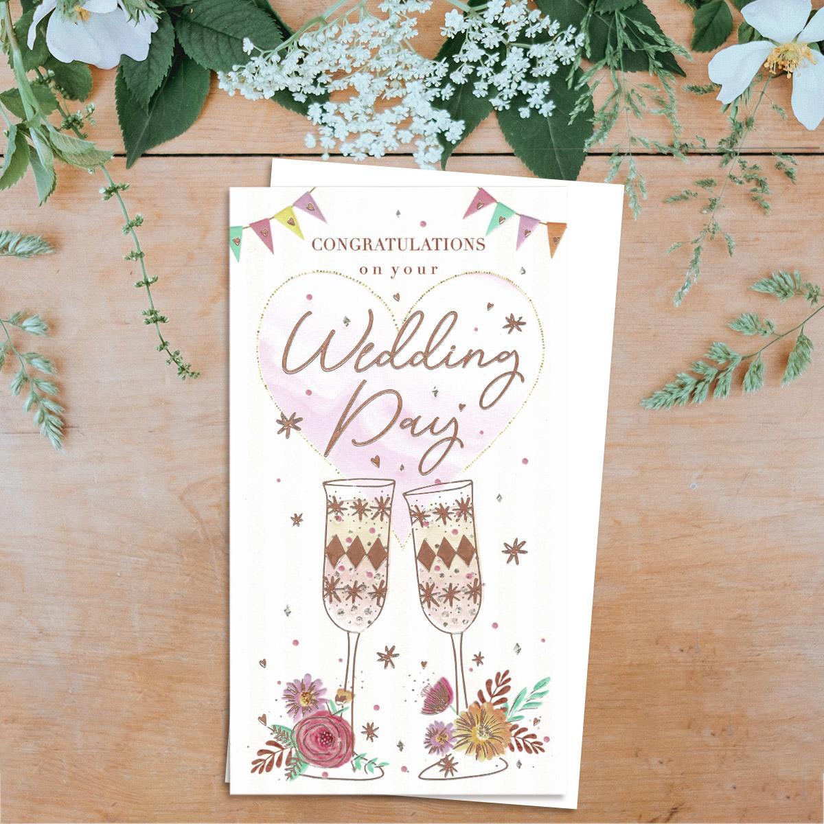 Decorative Glasses Wedding Card Sitting On A Display Shelf