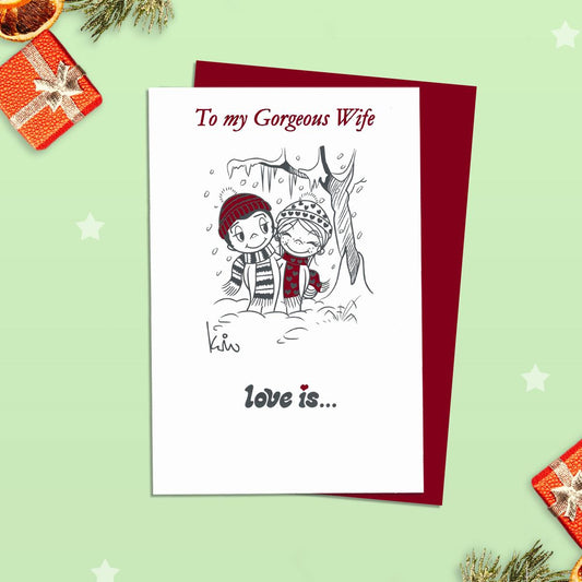 Wife Christmas Card Alongside Its Red Envelope