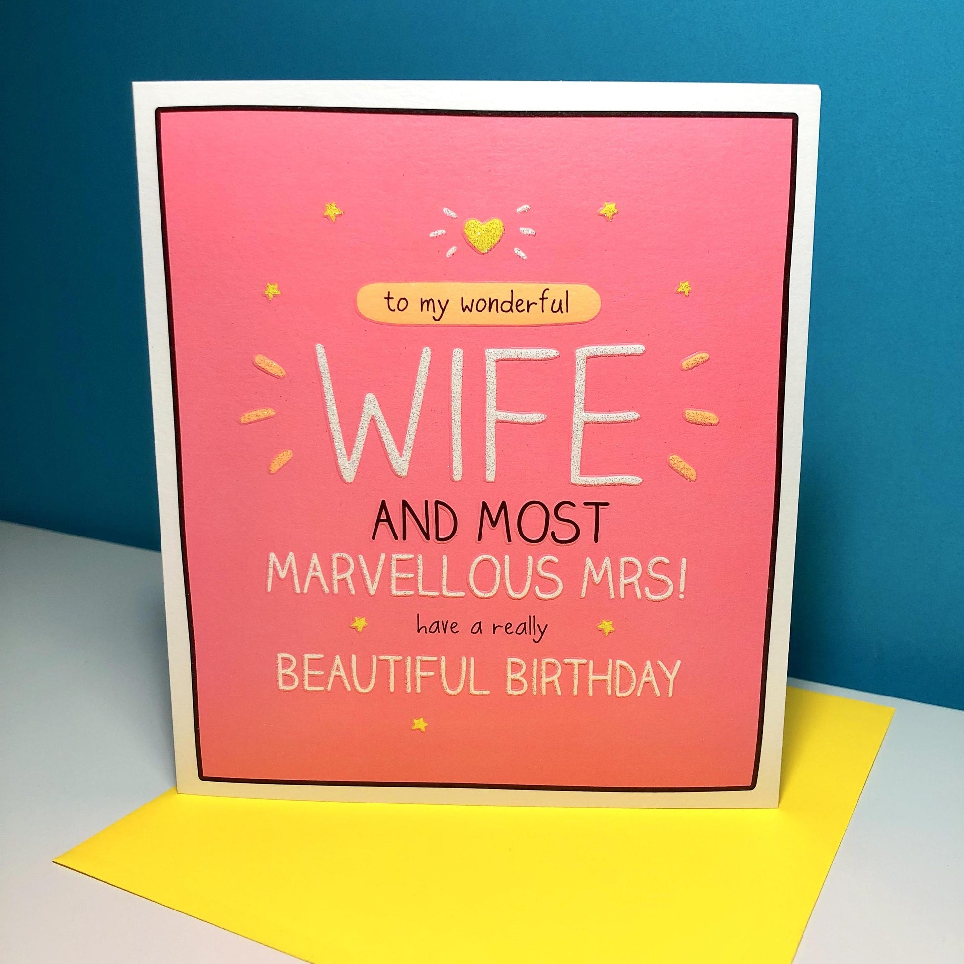 Happy Jackson Wife Birthday Card Sitting On Its Neon Yellow Envelope